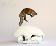 FOX LEAPING IN THE SNOW vulpes vulpes